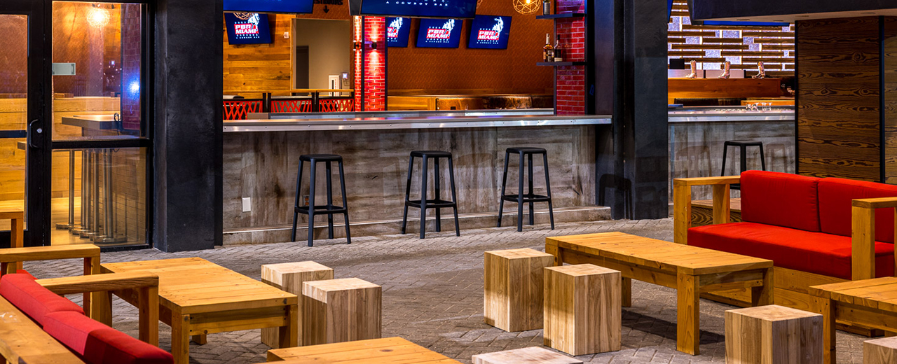 Image of the outdoor and bar seating at PBR Miami.
